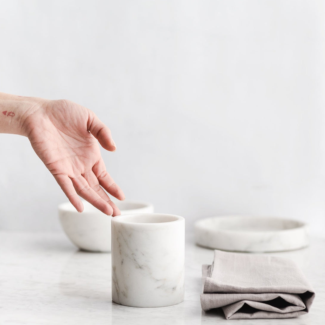 Luxurious Italian Marble Cup [luxxdesign.com]: A touch of elegance for your morning routine. Indulge in the smooth perfection of this handcrafted Italian marble toothbrush holder. Shop designer marble objects at luxxdesign.com.